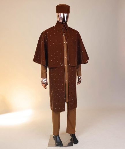 An “Eyes Wide Shut” syrup brown Italian velvet Ceremonial suktan with gold crystals Swarovski stone