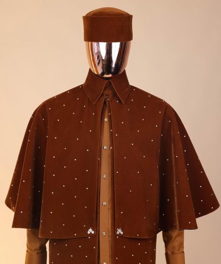 An “Eyes Wide Shut” syrup brown Italian velvet Ceremonial suktan with gold crystals Swarovski stone