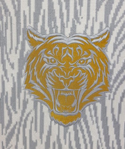 A White, roaring tiger metallic wire embroidery details Agbada