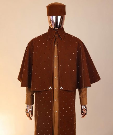 An “Eyes Wide Shut” syrup brown Italian velvet Ceremonial suktan with gold crystals Swarovski stone