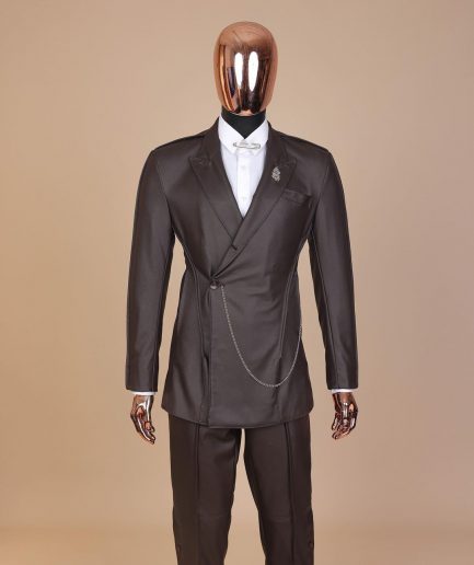 A #Herd” brown leather, knitted & outer layered peak lapel wrap suit