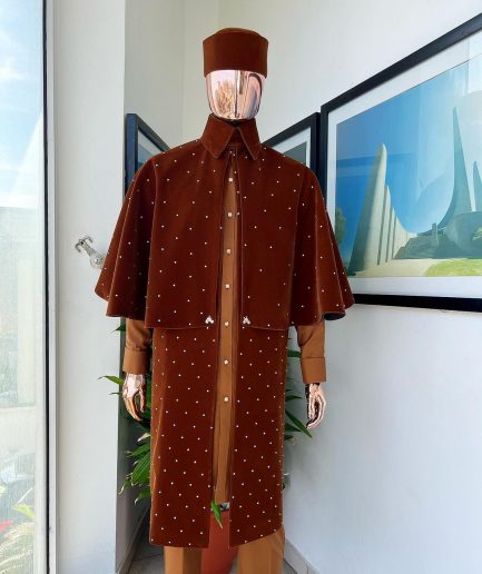 An “Eyes Wide Shut” syrup brown Italian velvet Ceremonial suktan with gold crystals Swarovski stone