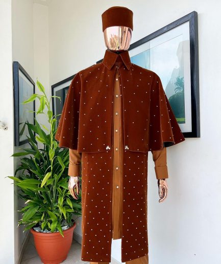 An “Eyes Wide Shut” syrup brown Italian velvet Ceremonial suktan with gold crystals Swarovski stone