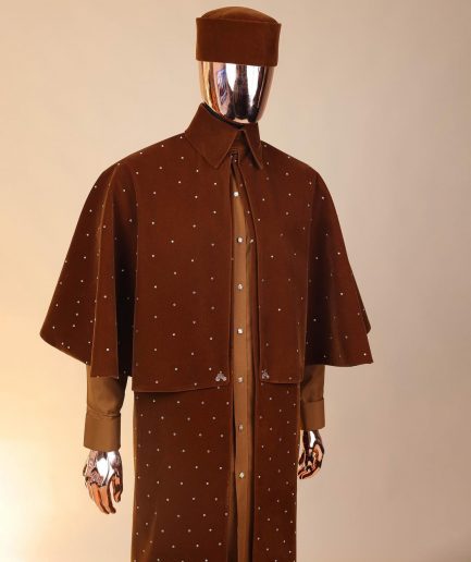 An “Eyes Wide Shut” syrup brown Italian velvet Ceremonial suktan with gold crystals Swarovski stone