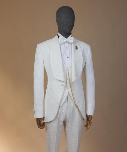 An ivory white, elastic, basket weave layered floral jacquard shawl lapel tuxedo suit.