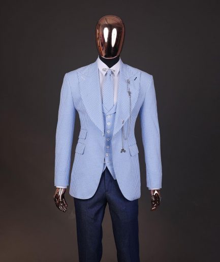 A “peaky blinders” skye blue and white check, seer sucker fabric, knitted, peak lapel suit