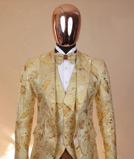The “Metaphor” gold and splash of caramel brown peak lapel metallic jacquard tuxedo suit