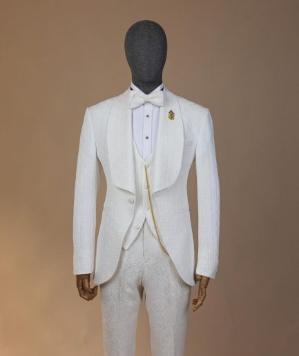 An ivory white, elastic, basket weave layered floral jacquard shawl lapel tuxedo suit.