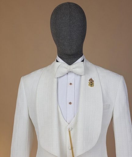 An ivory white, elastic, basket weave layered floral jacquard shawl lapel tuxedo suit.