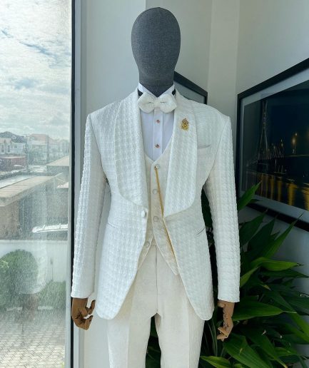 An Ivory white, swollen floral jacquard shawl lapel tuxedo suit.