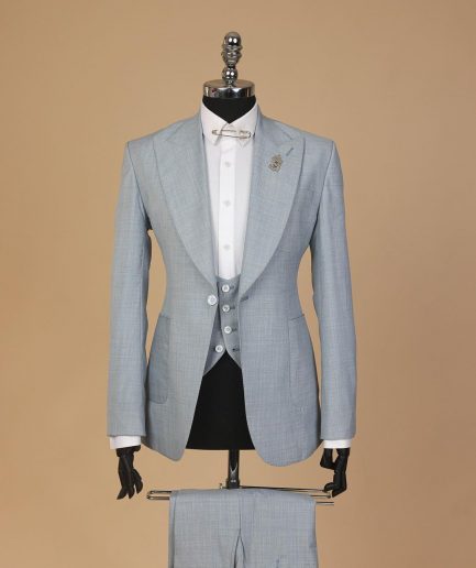 An Irish Maya blue, knitted peak lapel, patch pocket suit