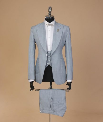 An Irish Maya blue, knitted peak lapel, patch pocket suit