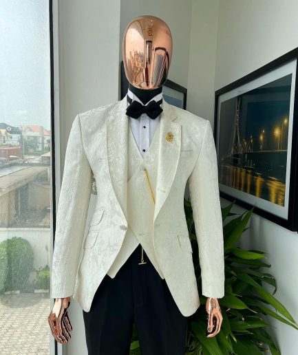 An ivory white, knitted, root floral jacquard notch tuxedo lapel suit