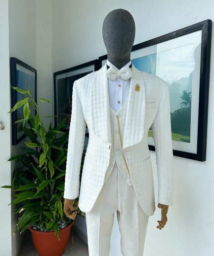 An Ivory white, swollen floral jacquard shawl lapel tuxedo suit.