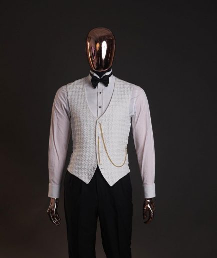 An Ivory white, swollen floral jacquard shawl lapel tuxedo suit