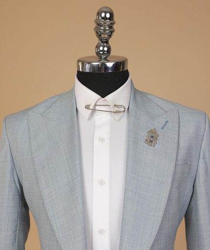 An Irish Maya blue, knitted peak lapel, patch pocket suit