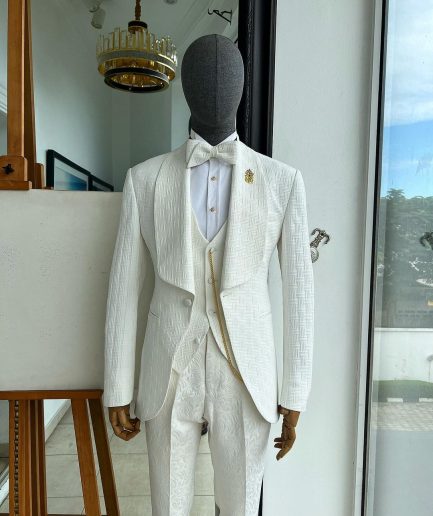 An ivory white, elastic, basket weave layered floral jacquard shawl lapel tuxedo suit.