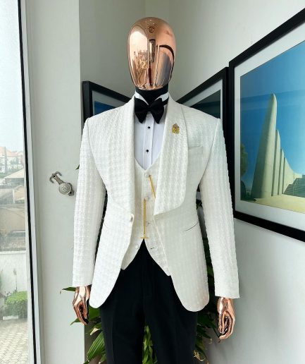 An Ivory white, swollen floral jacquard shawl lapel tuxedo suit