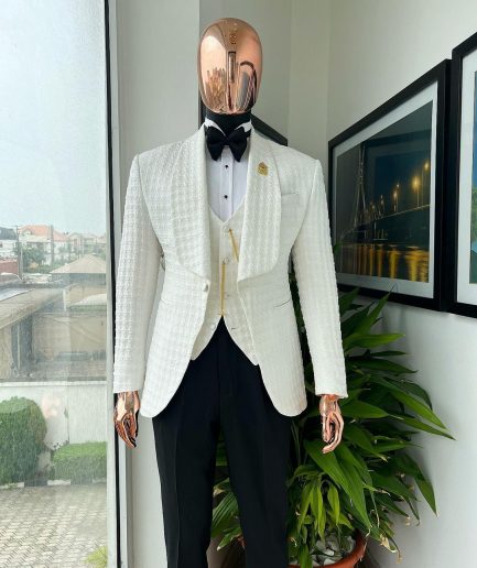 An Ivory white, swollen floral jacquard shawl lapel tuxedo suit