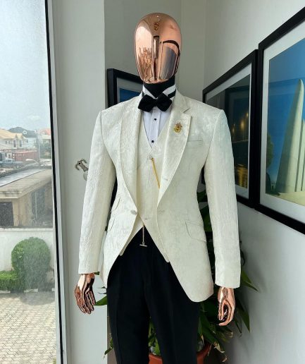 An ivory white, knitted, root floral jacquard notch tuxedo lapel suit