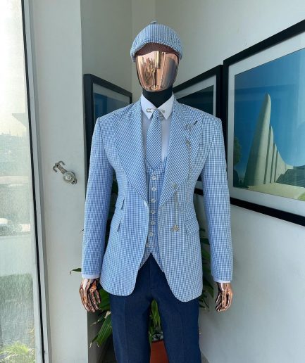 A “peaky blinders” skye blue and white check, seer sucker fabric, knitted, peak lapel suit