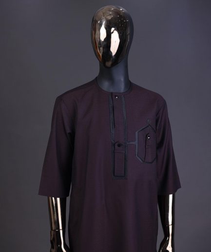An Umber brown, connected flap and combat pocket with black lines, black Swarovski button detailing kaftan and Sokoto
