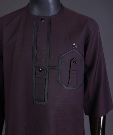 An Umber brown, connected flap and combat pocket with black lines, black Swarovski button detailing kaftan and Sokoto