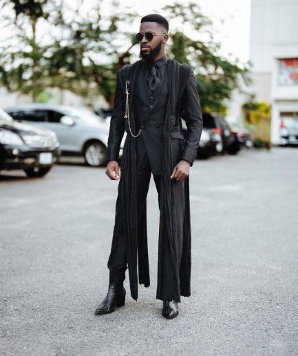 A monochrome Charcoal black deconstructed double breasted jacket with flare