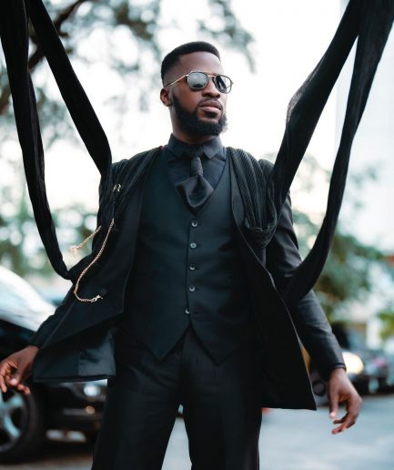 A monochrome Charcoal black deconstructed double breasted jacket with flare