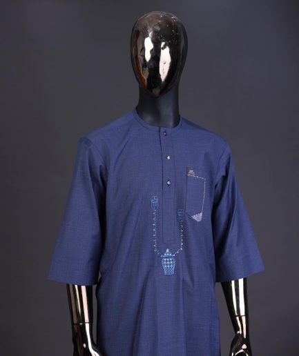 A Navy blue front flap with a clear view Swarovski button, connected sailor and basket embroidery detailing kaftan and Sokoto
