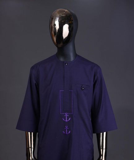 An eggplant purple, front flap with black Swarovski button, square and anchor embroidery detailing kaftan and Sokoto