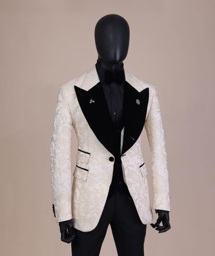 An Ivory white and Gold Floral patterned Peak lapel metallic jacquard tuxedo suit.