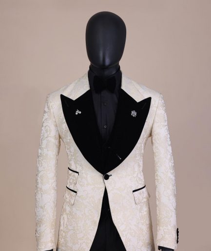 An Ivory white and Gold Floral patterned Peak lapel metallic jacquard tuxedo suit.