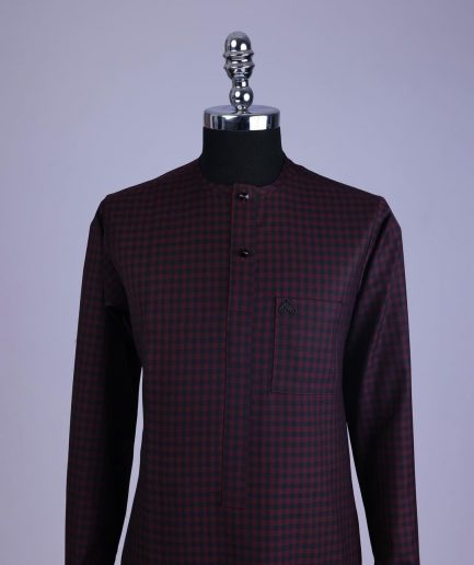 A Checkered black and burgundy with black Swarovski button detailing kaftan and sokoto