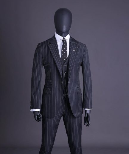 A charcoal black and ivory pencil stripe, notch lapel, knitted one button suit