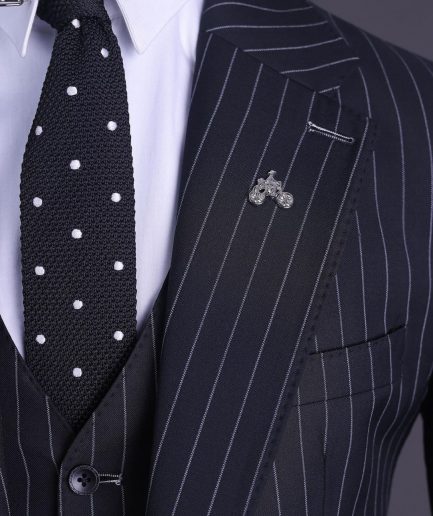 A charcoal black and ivory pencil stripe, notch lapel, knitted one button suit
