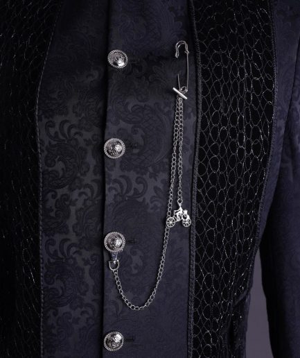 A floral midnight blue “wakanda” with L metallic embroidery, trench jacquard safari suit