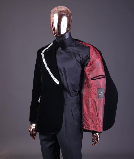 A reloaded monochrome “herd” charcoal black soaked velvet peak lapel wrap tuxedo suit