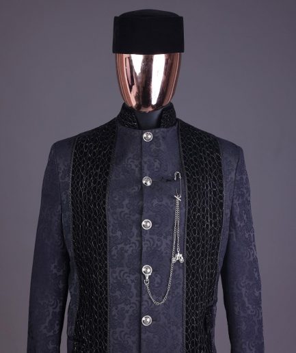 A floral midnight blue “wakanda” with L metallic embroidery, trench jacquard safari suit
