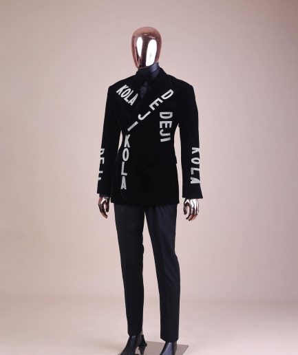 An “inscribe” your name charcoal black soaked velvet peak lapel wrap tuxedo suit