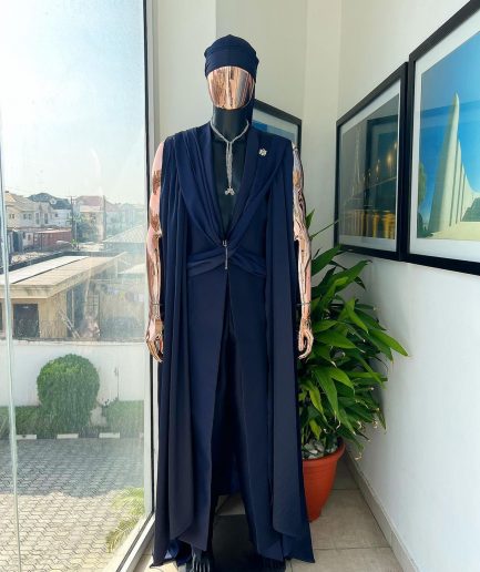 A “Mr Money” navy blue, deconstructed veil on trench silk peak lapel jacket