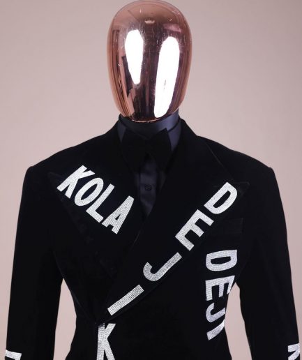 An “inscribe” your name charcoal black soaked velvet peak lapel wrap tuxedo suit
