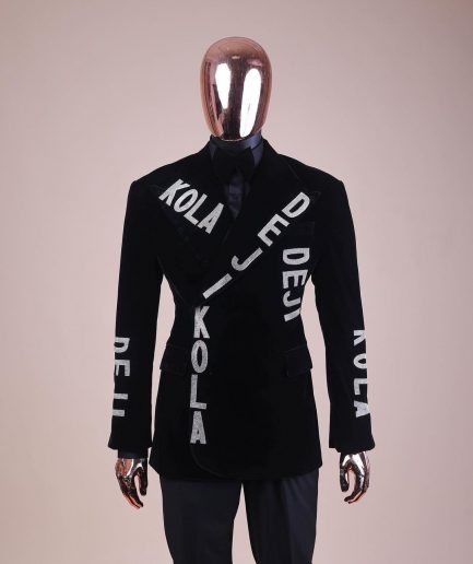 An “inscribe” your name charcoal black soaked velvet peak lapel wrap tuxedo suit