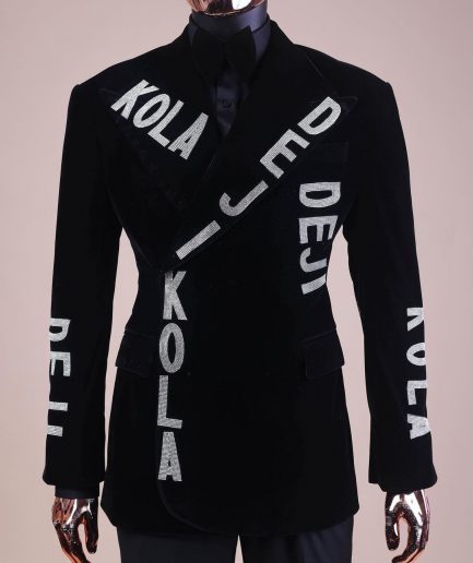 An “inscribe” your name charcoal black soaked velvet peak lapel wrap tuxedo suit