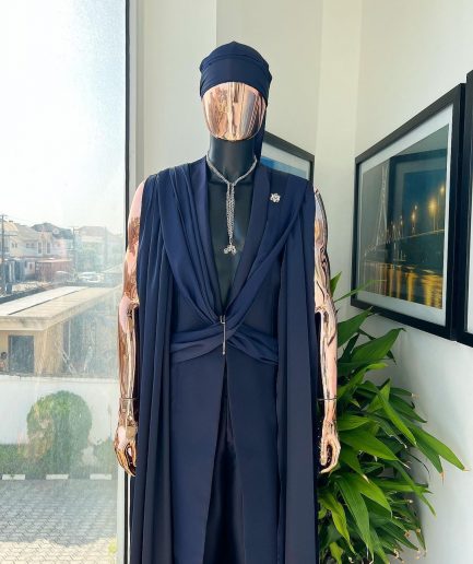 A “Mr Money” navy blue, deconstructed veil on trench silk peak lapel jacket