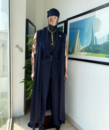 A “Mr Money” navy blue, deconstructed veil on trench silk peak lapel jacket