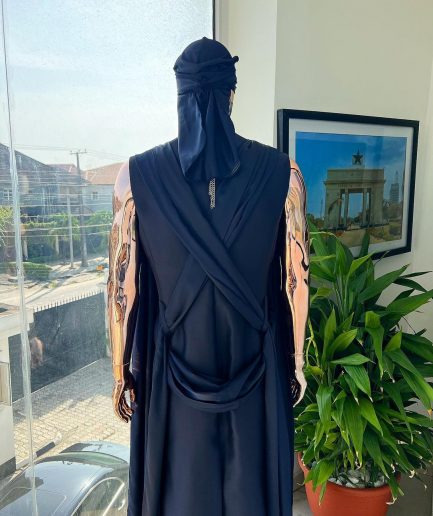 A “Mr Money” navy blue, deconstructed veil on trench silk peak lapel jacket