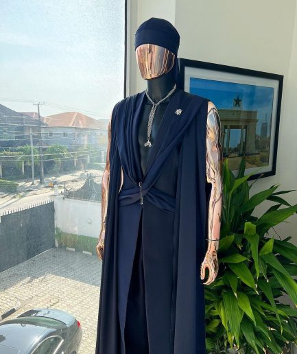 A “Mr Money” navy blue, deconstructed veil on trench silk peak lapel jacket