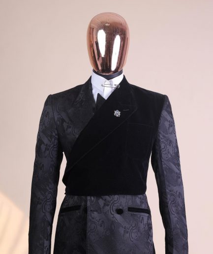 A charcoal black “equalizer” quadruple breasted, knitted, peak lapel with velvet tuxedo jacquard suit
