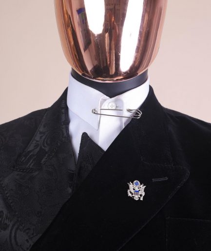 A charcoal black “equalizer” quadruple breasted, knitted, layered peak lapel with velvet overlay-ed tuxedo jacquard suit